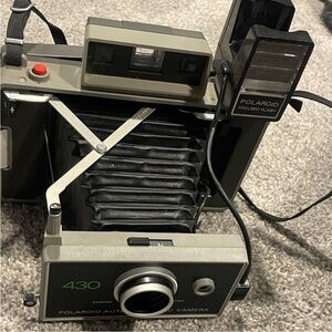 Polaroid Black and Silver Film Camera with Automatic Exposure